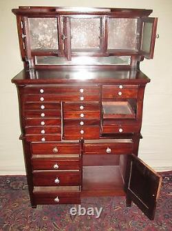 19th C 20 Drawer Mahogany Antique Dental Cabinet By The American Cabinet Co