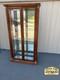 67753 Pulaski Traditional Glass Front Curio Cabinet With Brass Accents