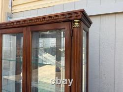 67753 Pulaski Traditional Glass Front Curio Cabinet with Brass Accents