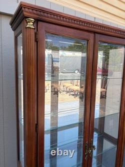 67753 Pulaski Traditional Glass Front Curio Cabinet with Brass Accents