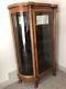 Antique Oak Curved Glass China Cabinet Withpaw Feet & Mirrored Back Panel