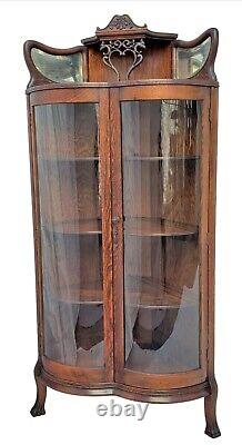 American Tiger Oak Bowed Bent Glass China Corner Cabinet with Griffins 1900s