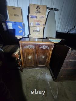 Antique Brown Carved Wood 2-Door Cabinet Raised Panel Knobs