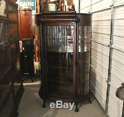 Antique Curved Glass Oak China Cabinet carved lion heads claw feet