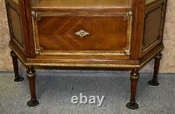 Antique French Carved Walnut One Door Curio Cabinet withGold Highlights