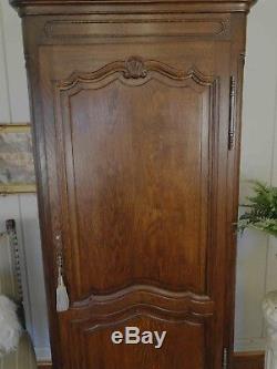 Antique French Country Armoire Tall Narrow Dark Oak Carved Key Shell