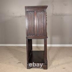 Antique French Gothic Carved Oak Cabinet Stand with Figural Panels Heraldic Door