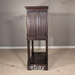 Antique French Gothic Carved Oak Cabinet Stand with Figural Panels Heraldic Door