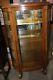 Antique Hingher Furniture Co. Illuminated And Curved Curio Display Oak Cabinet