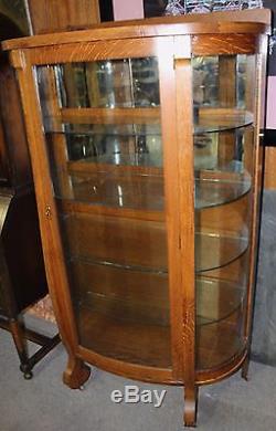 Antique Hingher Furniture Co. Illuminated and Curved Curio Display Oak Cabinet