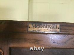 Antique Hoosier Cabinet By McDougall With Pullout Porcelain Tabletop