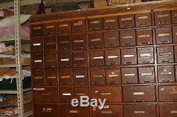 Antique Oak 94 drawer hardware store display cabinet 1906