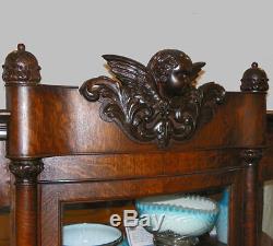 Antique Oak China Curio Cabinet with carved Cherub in the crest