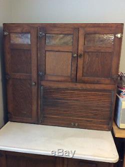 Antique Oak Hoosier Cabinet