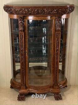 Antique Oak R. J. Horner Serpentine Glass Oak China Cabinet with Lion Heads