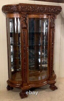 Antique Oak R. J. Horner Serpentine Glass Oak China Cabinet with Lion Heads