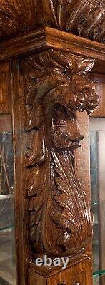 Antique Oak R. J. Horner Serpentine Glass Oak China Cabinet with Lion Heads