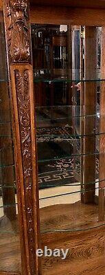 Antique Oak R. J. Horner Serpentine Glass Oak China Cabinet with Lion Heads