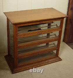 Antique Oak Ribbon Cabinet