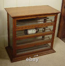 Antique Oak Ribbon Cabinet