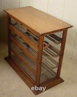 Antique Oak Ribbon Cabinet