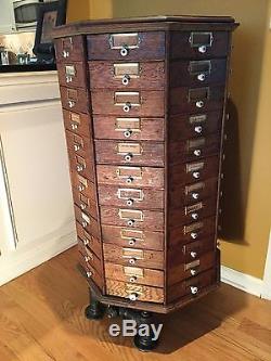 Antique Oak revolving 96 drawer hardware store bolt display cabinet 1890's