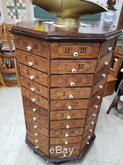 Antique Octagon Rotating Hardware Store Cabinet 88 drawers