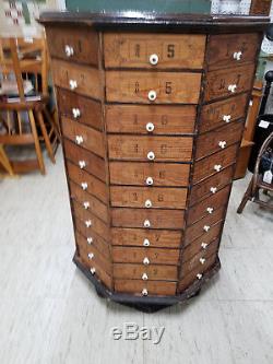 Antique Octagon Rotating Hardware Store Cabinet 88 drawers