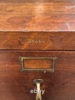 Antique Tiger Oak Three Drawer File Cabinet with Raised Panels by Globe Wernicke