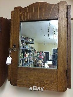 Antique Tiger Oak medicine cabinet
