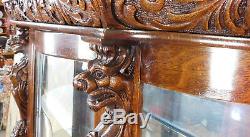 Antique Victorian Carved Figural Quartered Oak Curved Glass Curio Cabinet c1900