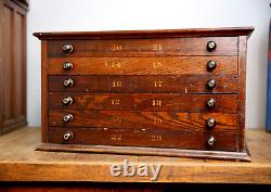 Antique Watchmaker Apothecary Cabinet Letterpress Typeset wood drawer organizer