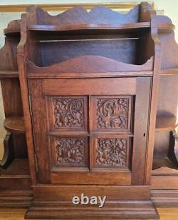 Antique Wooden Hanging Wall Cabinet With Carved Panels