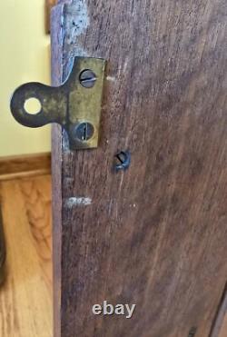Antique Wooden Hanging Wall Cabinet With Carved Panels