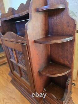 Antique Wooden Hanging Wall Cabinet With Carved Panels