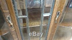 Antique curved glass quartersawn oak China Cabinet with leaded glass door