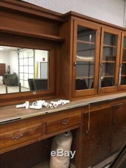 Antique drugstore backbar approx. 19 ft. Long, 83 inches tall