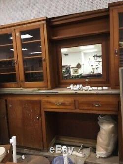 Antique drugstore backbar approx. 19 ft. Long, 83 inches tall