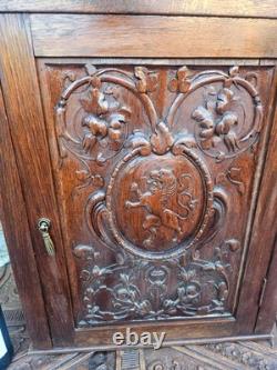 Antique flemish wood wall apothecary cabinet heraldic lion decor