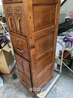 Antique oak file cabinet