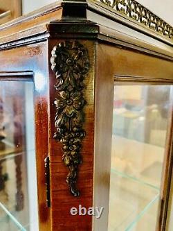 Antique wall curio cabinet