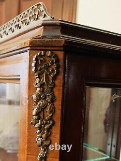 Antique wall curio cabinet