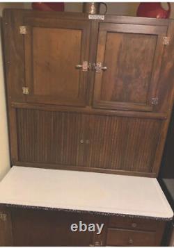 Authentic Hoosier Cabinet with Flour sifter and all original glass accessories