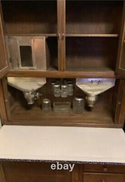 Authentic Hoosier Cabinet with Flour sifter and all original glass accessories