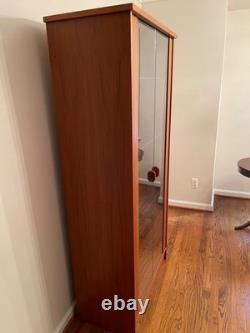 Beautiful midcentury- modern teak cabinet with lighting from House of Denmark