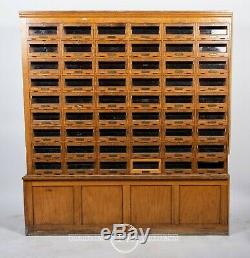 C. 1920 Glass Front 54 Drawer Locking Apothecary Cabinet With Keys