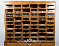 C. 1920 Glass Front 54 Drawer Locking Apothecary Cabinet With Keys