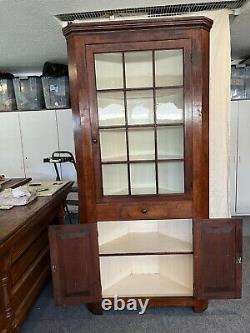 Early 1800s maple corner cupboard