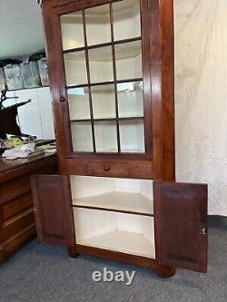 Early 1800s maple corner cupboard