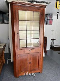 Early 1800s maple corner cupboard